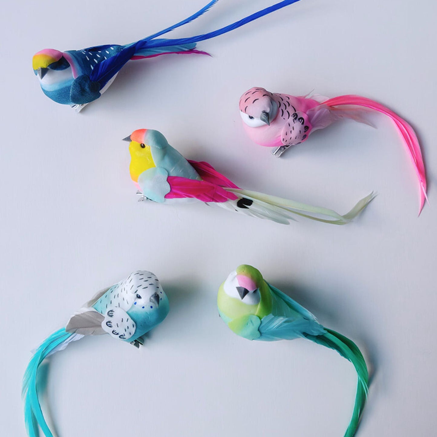 Hand painrted clip on feather bird easter decorations.