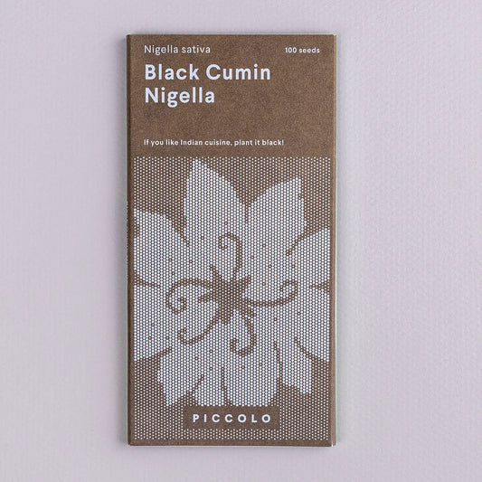 Seed packet for Black Cumin Nigella on a light gray background