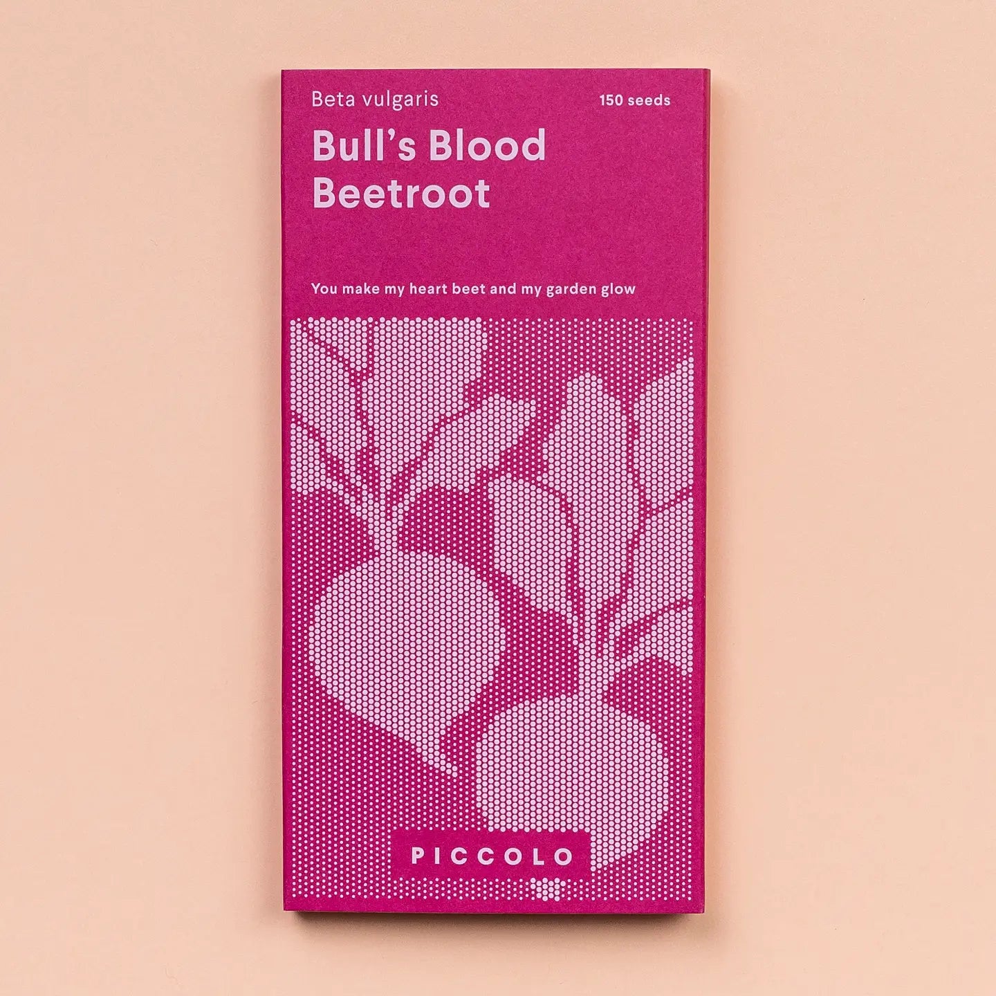 Pink seed packet for 'Bull's Blood Beetroot' with white text and design on a beige background
