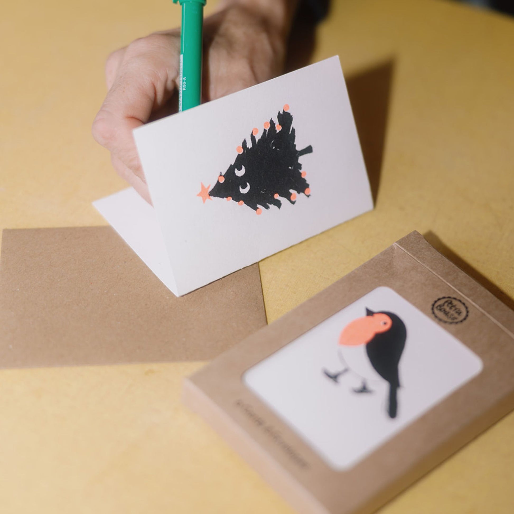Five sets of mini riso printed Christmas cards in card boxes | Petra Boase
