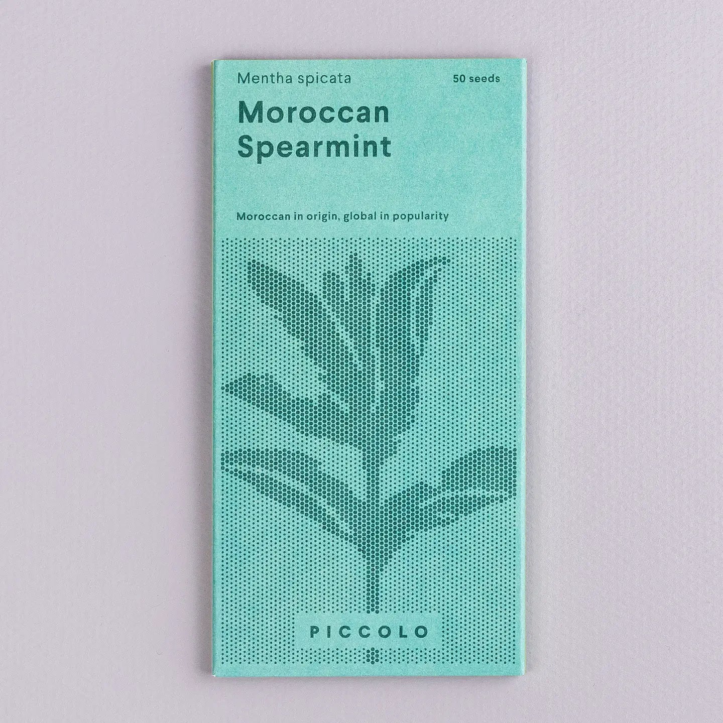 Teal seed packet labeled 'Moroccan Spearmint' on a light gray background