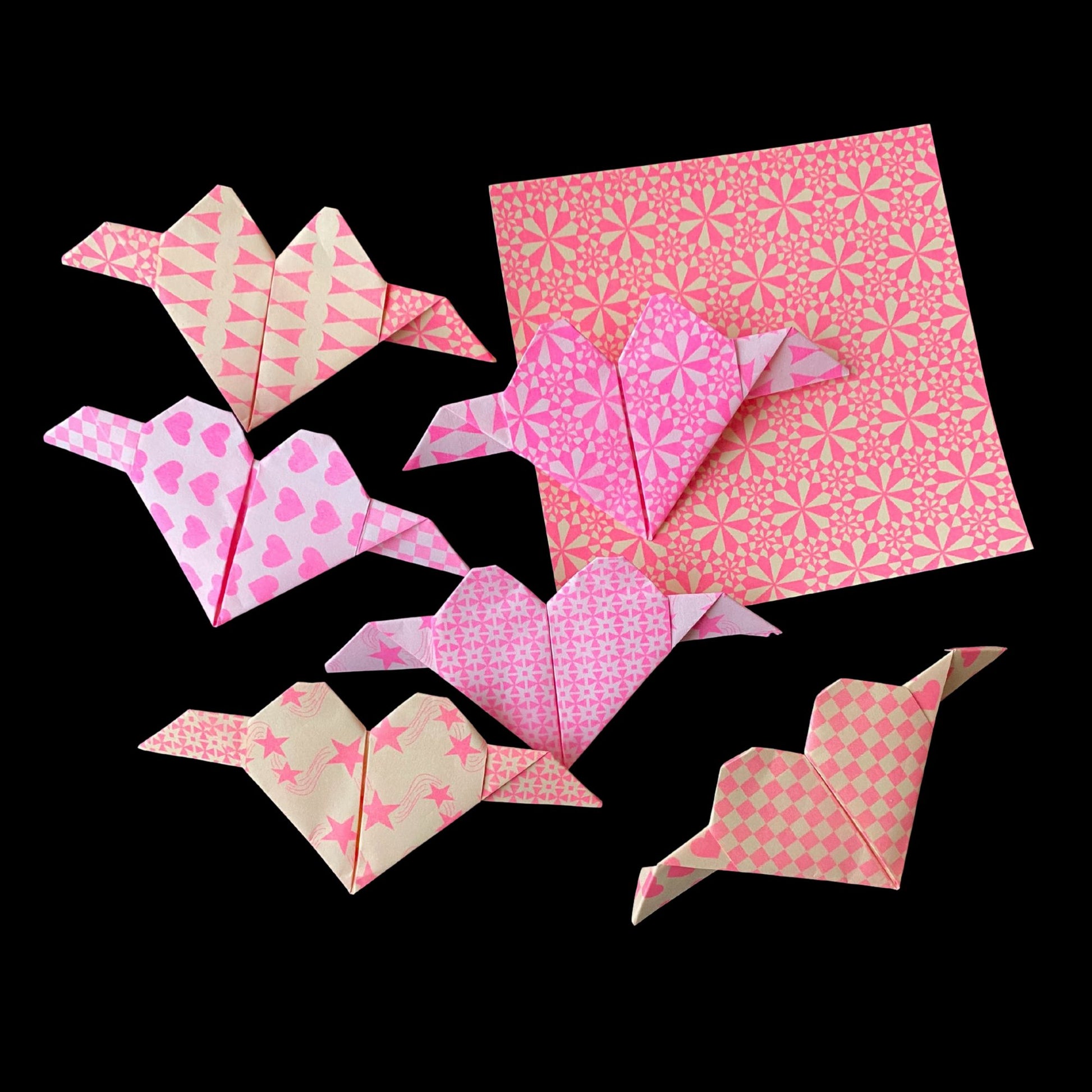 Origami Flouro Pink Pattern Paper Hearts on a black background