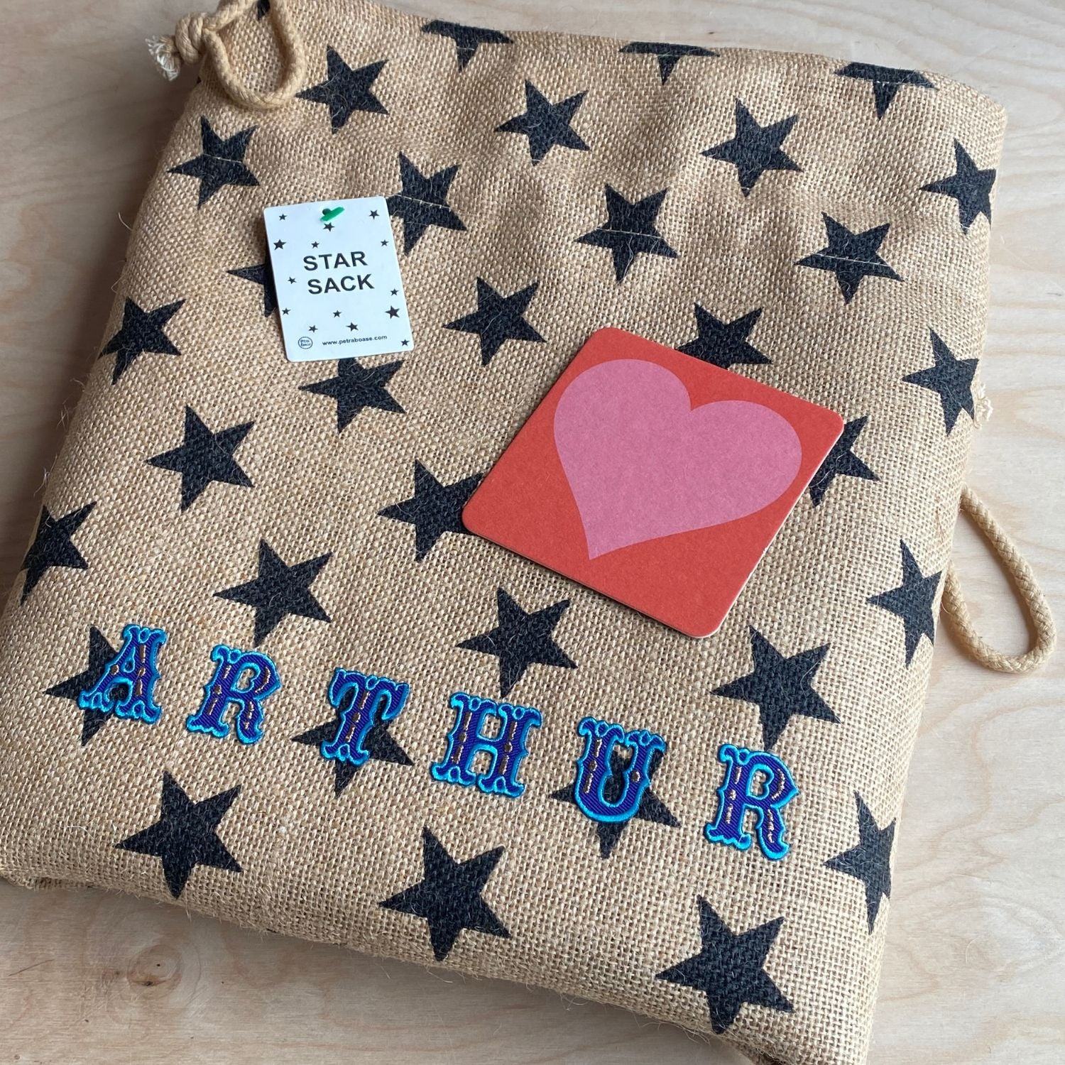 Personalised Star print present sack with blue letters by Petra Boase