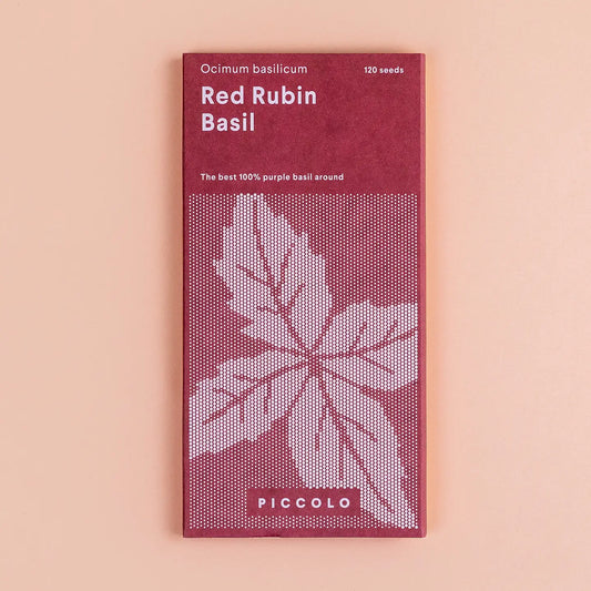 Packaging of Piccolo Red Rubin Basil seeds with a prominent leaf design on a red background.
