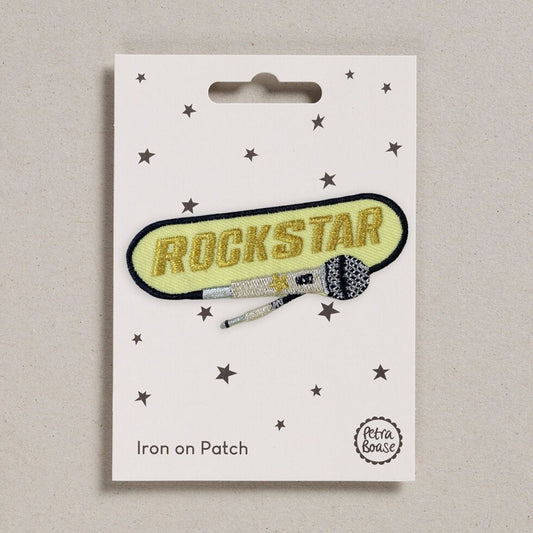 Rockstar iron on patch with a microphone detail.