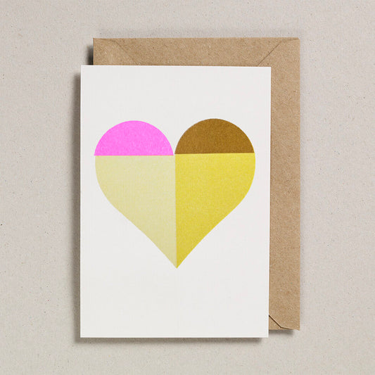 Greeting card with a pink and yellow heart design on a beige background