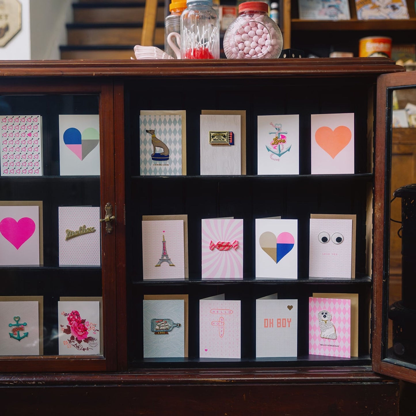 Sustainbly printed valentine, anniversay, wedding and love greeting cards in a vintage cuboard.