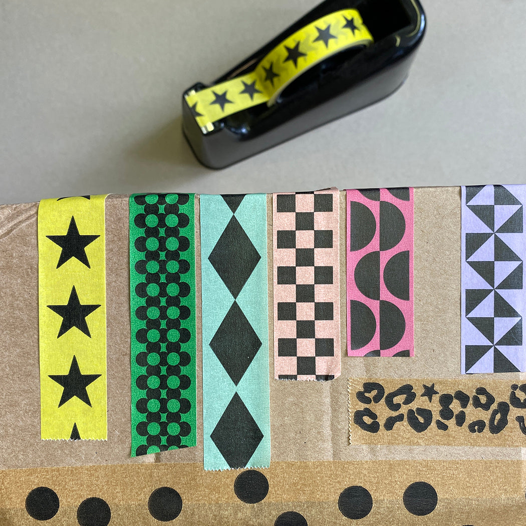 Pattern Paper adhesive tapes on a cardboard box.