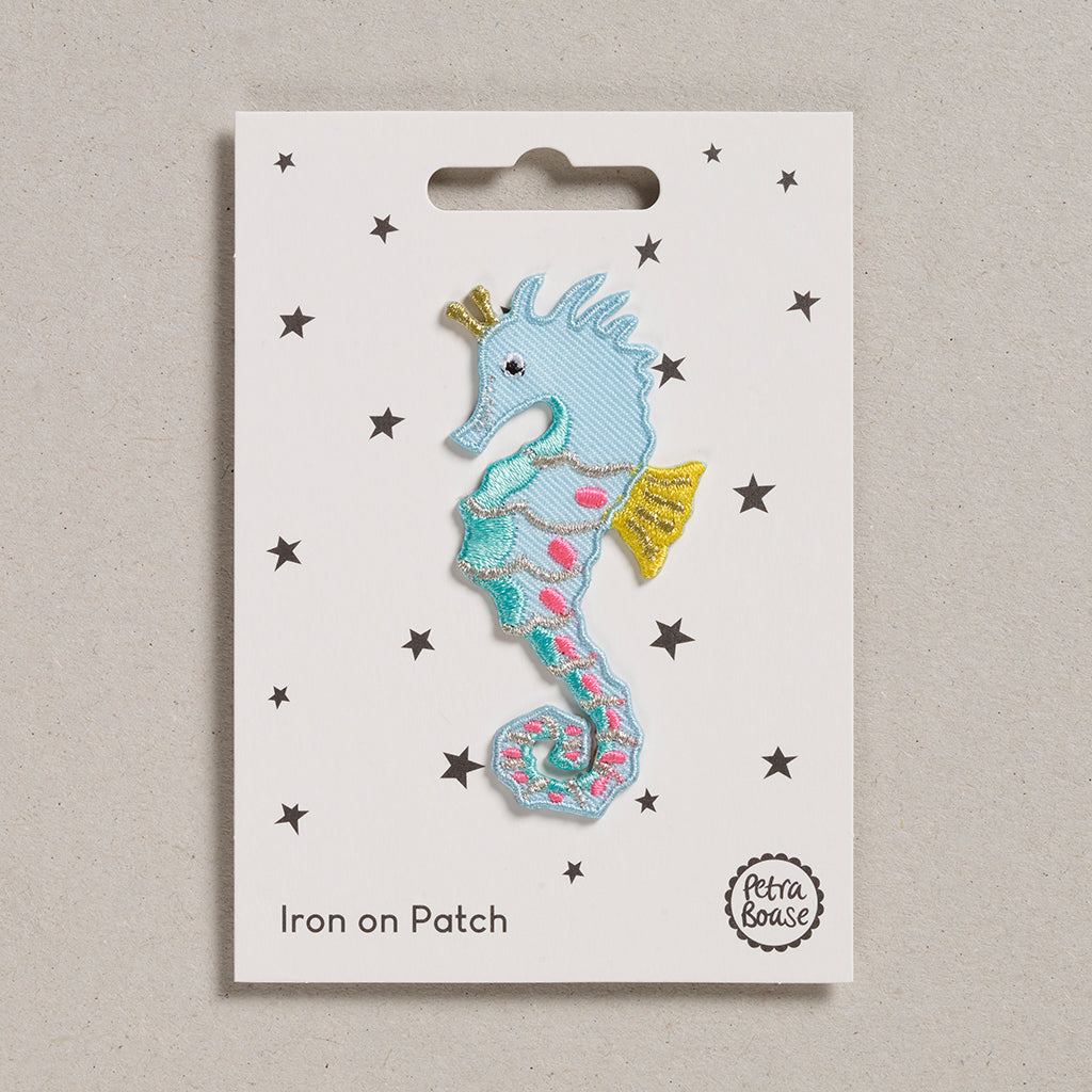 Pretty pale blue seahorse embroidered iron on patch.